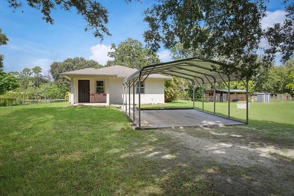 Photo of 359 W D Road #1a, Loxahatchee Groves, FL 33470 (MLS # R11148086)