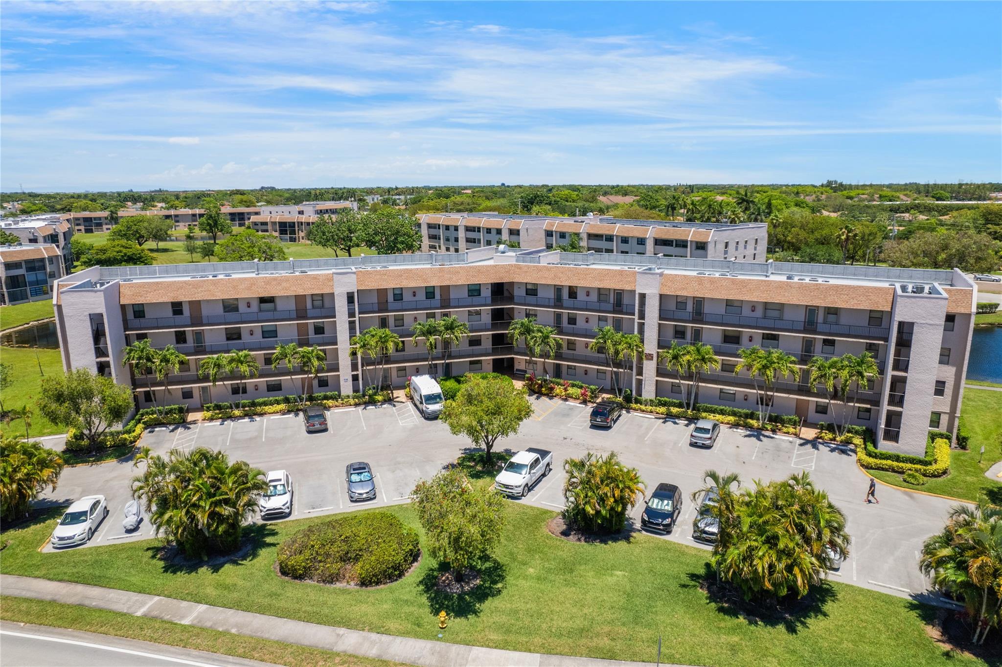 Welcome to this spacious corner unit and beautifully maintained 2-bedroom, 2-bathroom condo located in the highly desirable 55+ resort-style community of Sunrise Lakes Phase IV. This freshly painted unit features tile flooring throughout and a convenient in-unit washer and dryer. The community offers an impressive array of amenities, including:Clubhouse, Heated Pool & Spa, Fitness Center, Golf, Tennis Courts, Billiard Room, Theater and so much more!!! Experience comfort, convenience, and an active lifestyle in one of the most sought-after communities in Sunrise. Don’t miss this opportunity!