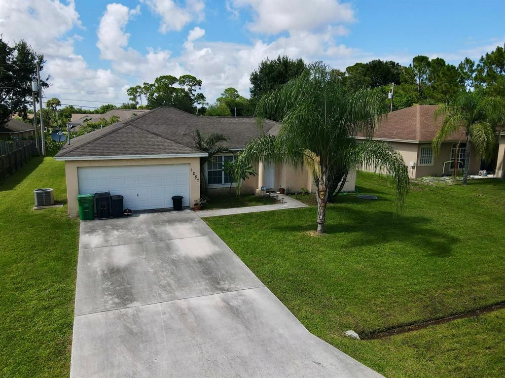 Photo of 1257 SW Herald Road, Port Saint Lucie, FL 34953 (MLS # R10732761)