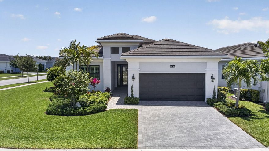 (More photos coming soon!) Are you kidding?? A highly desired corner lot with premium Kolter Homes upgrades.. without the premium price tag or the new construction wait? This home is everything you'd choose if you were designing it yourself.    Built in 2023, this Fiesta model in the newest 55+ community in Palm Beach County is ready for its next owner. Already equipped with plumbing for a future pool and a summer kitchen, this one is truly move in ready. Furniture is negotiable for a turnkey experience, just bring your toothbrush!  The primary suite is a dream. The bathroom is where handicap accessible meets luxury, with a gorgeous roll in shower and beautifully designed finishes. The entire space feels like a private retreat. Just a golf cart ride away from resort style amenities. There's something for everyone, even for the grandkids, with access to the Westlake Adventure Park.    Don't wait. This one won't last.