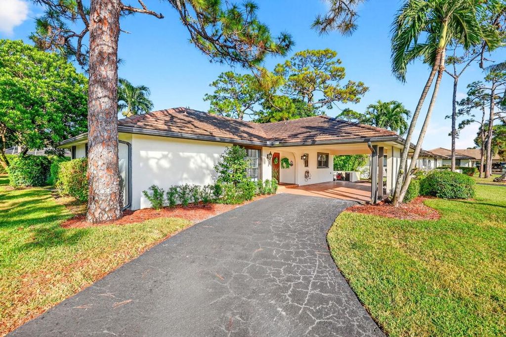 Photo of 435 Pine Villa Drive, Atlantis, FL 33462 (MLS # R11148534)