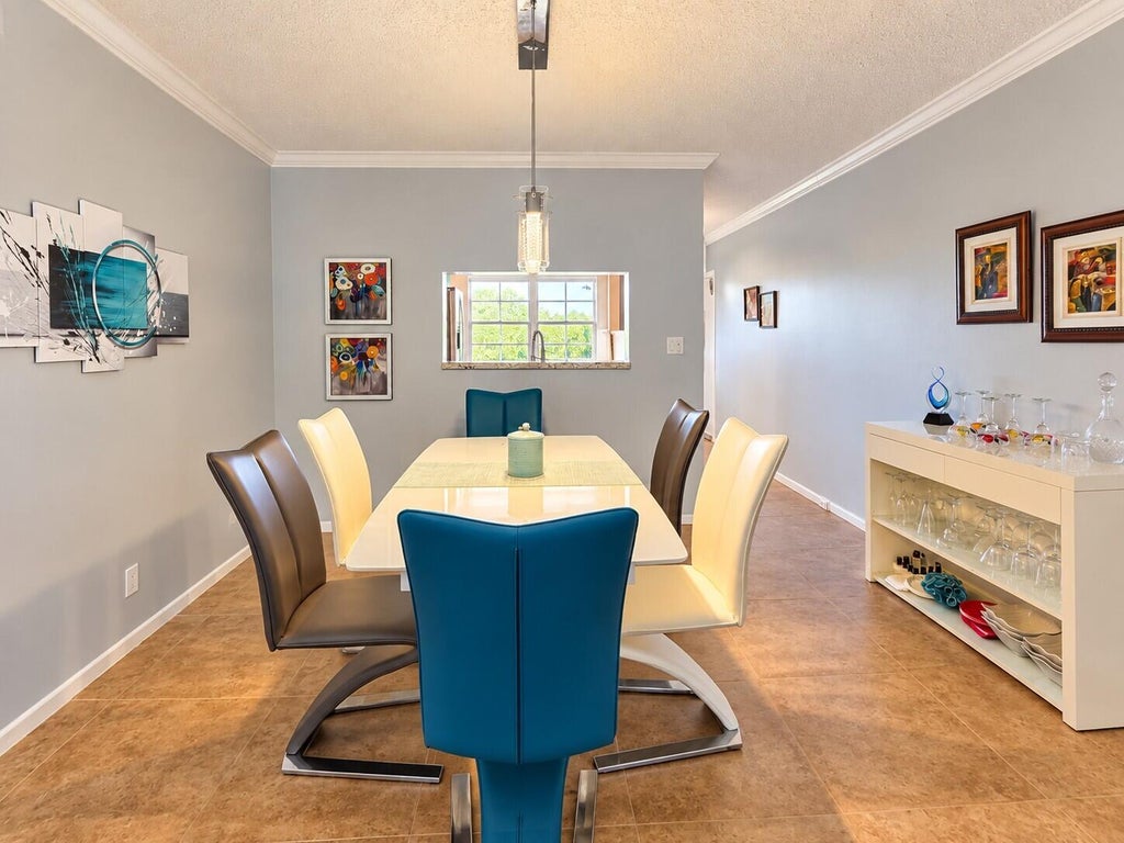 Photo of 2301 Lucaya Lane #O4, Coconut Creek, FL 33066 (MLS # B26080735)