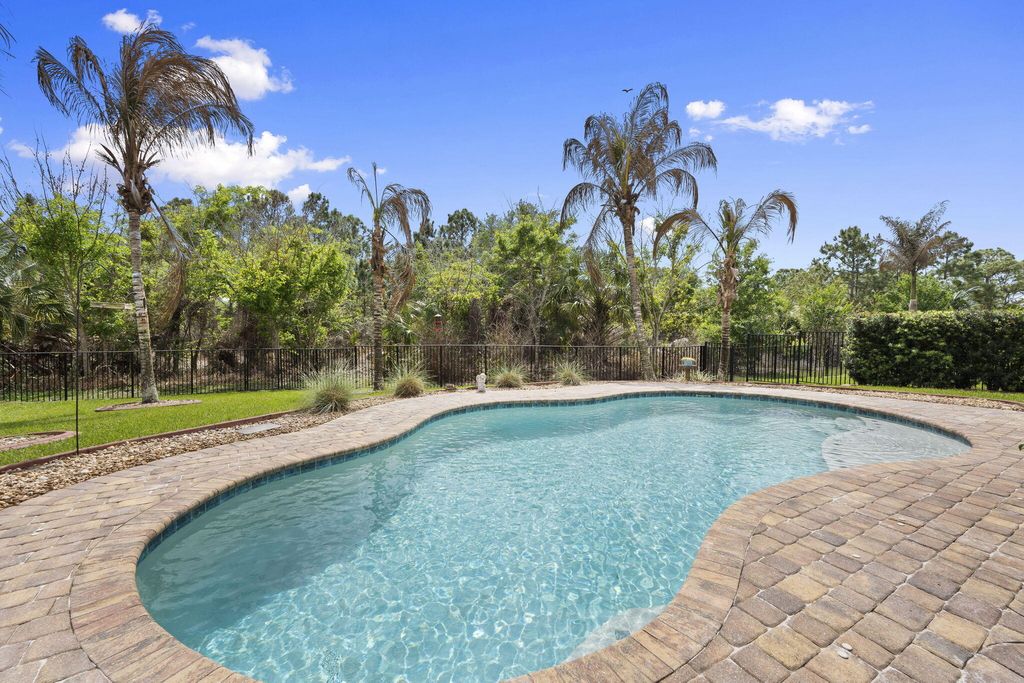 Photo of 5800 SW Longspur Lane, Palm City, FL 34990 (MLS # B26015526)