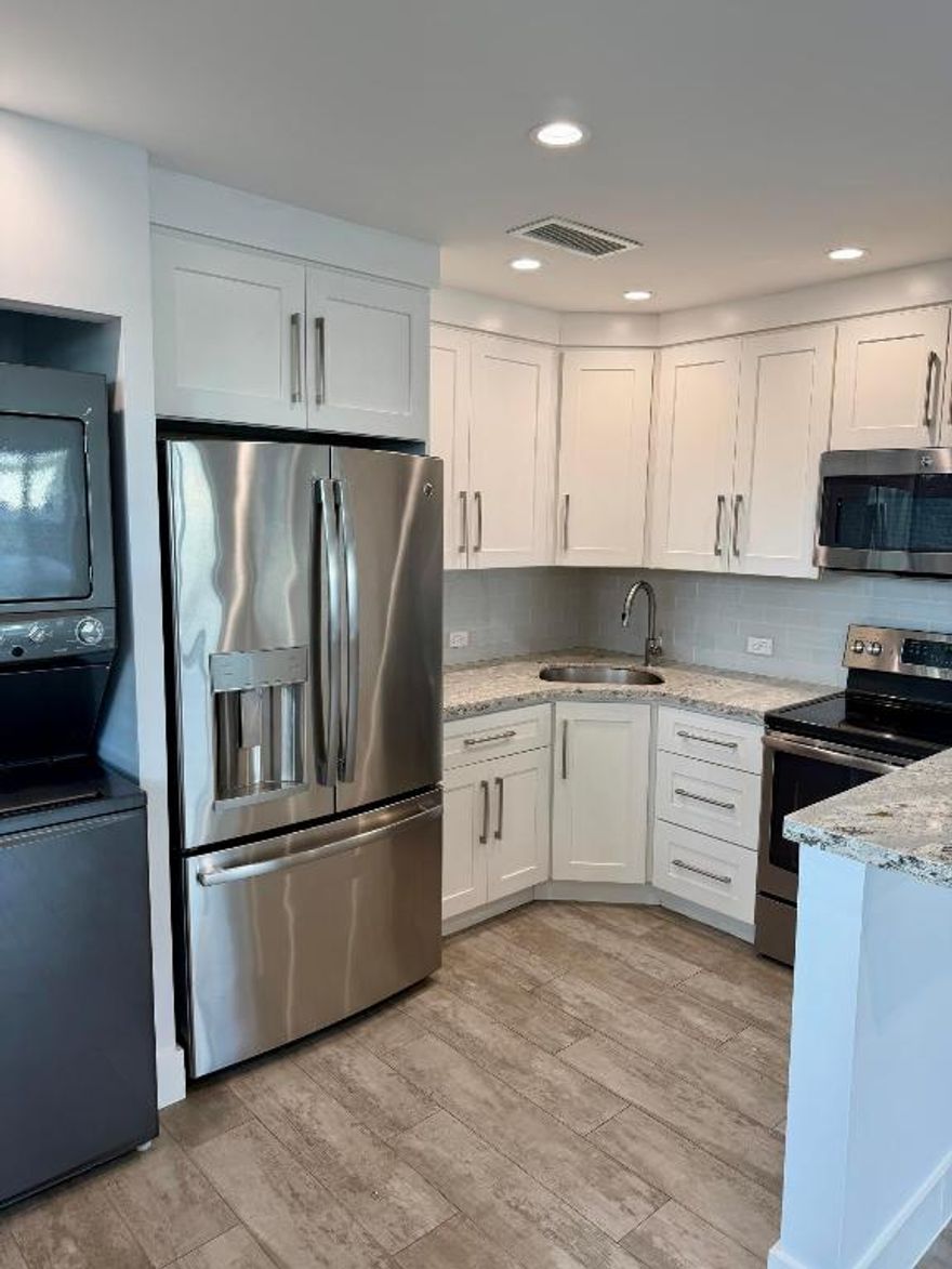 Great LOCATION ! Beautiful building, recently updated 1/1 unit with eastern location. New appliances, new fixtures. Close to shops /restaurants nearby. Very clean with Washer & Dryer in the unit. Large living area and large bedroom, IMPACT windows . Fully tiled bathroom with Glass doors. Very quiet living and abundant street parking.