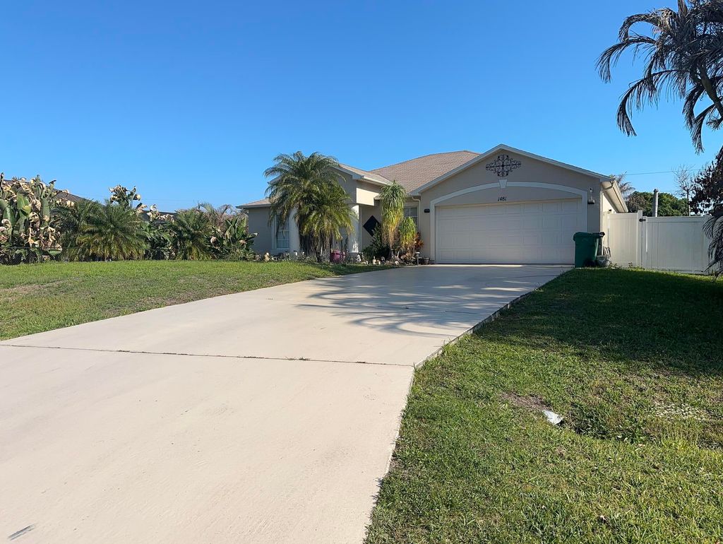 Photo of 1481 SW Dow Lane, Port Saint Lucie, FL 34953 (MLS # B26007023)