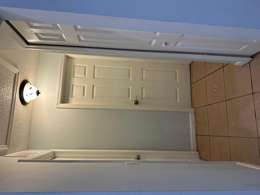 Photo of 1481 SW Dow Lane, Port Saint Lucie, FL 34953 (MLS # B26007023)