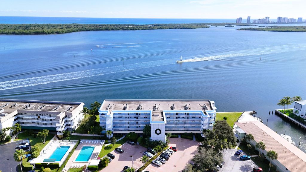 Photo of 60 Yacht Club Drive #103, North Palm Beach, FL 33408 (MLS # R11151013)