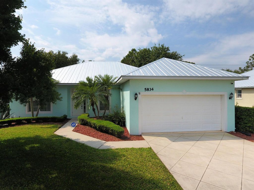 Photo of 5834 NW Windy Pines Lane, Port Saint Lucie, FL 34986 (MLS # R11084302)