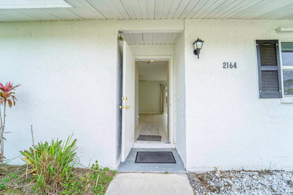 Photo of 2164 SE Gaslight Street, Port Saint Lucie, FL 34952 (MLS # R11153467)