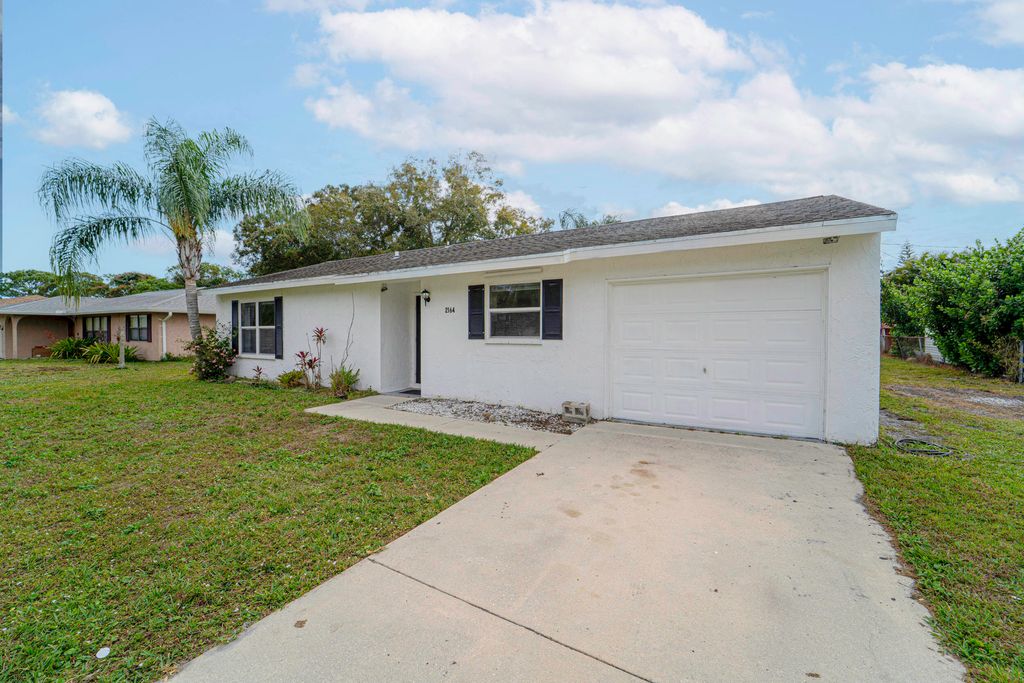Photo of 2164 SE Gaslight Street, Port Saint Lucie, FL 34952 (MLS # R11153467)