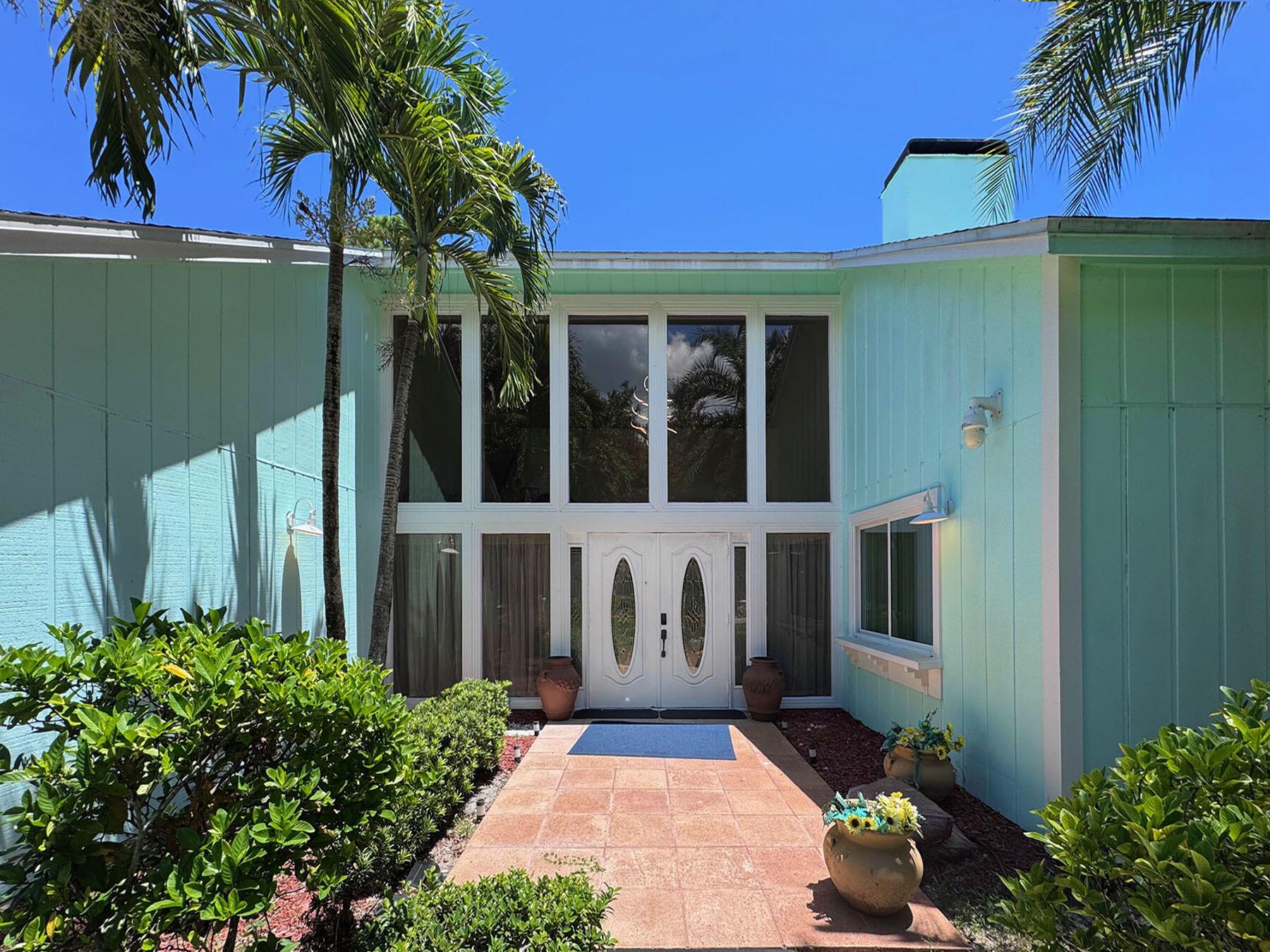 Beautiful Custom Home located in a nice Mature Neighborhood. One -of-a kind Home, featuring a large eat in Kitchen, with a pass through to the Patio/Pool area. Large formal Dining Room with Wood Burning Fireplace and an Elevator that takes you to the Master Bedroom which features its own Fireplace! The Laundry Room is conveniently located on the second floor. All this sits on a nicely landscaped .54 acre lot!