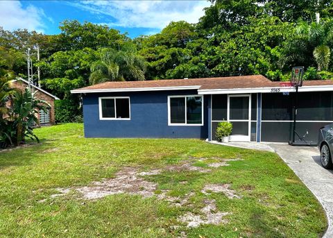 Photo of 5945 Morrison Avenue, Lake Worth, FL 33463 (MLS # B26050011)