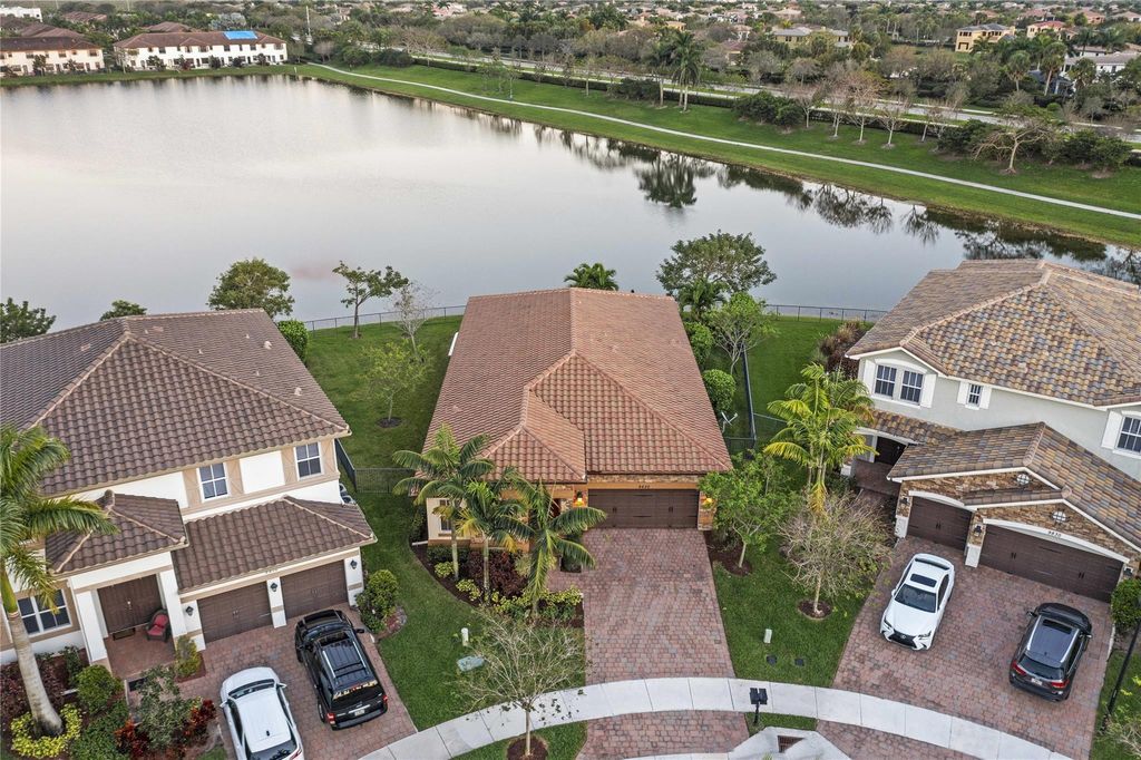 Photo of 9820 S Miralago Way, Parkland, FL 33076 (MLS # B26026990)
