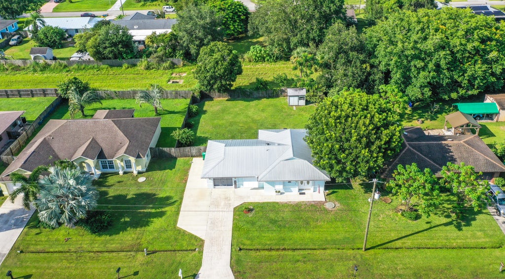 Photo of 1141 SW Gastador Avenue, Port Saint Lucie, FL 34953 (MLS # R11021857)