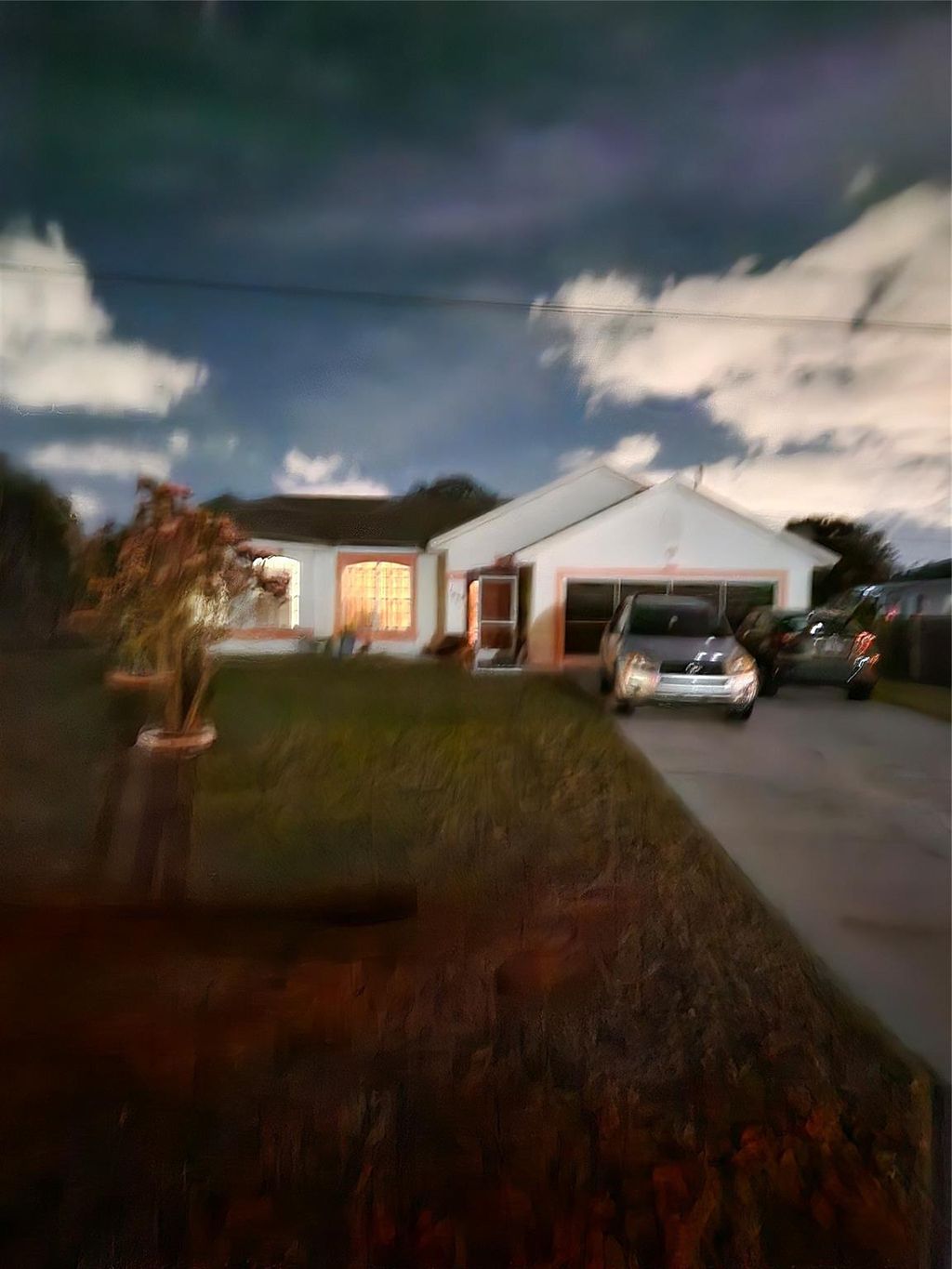Photo of 1894 SE Berkshire Boulevard, Port Saint Lucie, FL 34952 (MLS # F10422633)