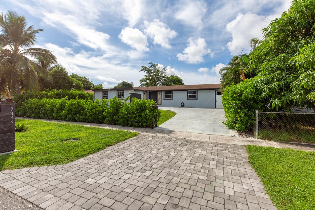 Photo of 3834 Mackinac Road, Lake Worth, FL 33462 (MLS # R11024270)