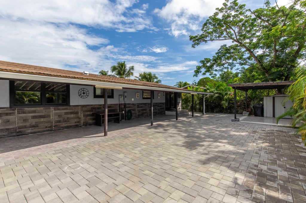 Photo of 3834 Mackinac Road, Lake Worth, FL 33462 (MLS # R11024270)