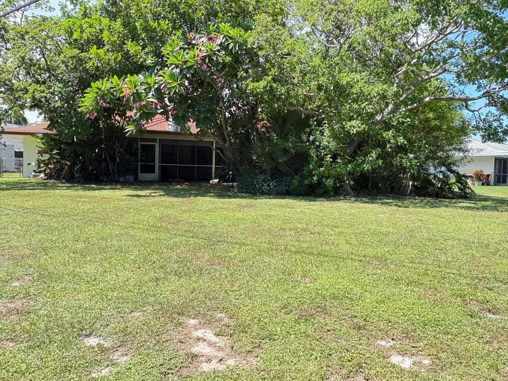 Photo of 8432 Waterway Drive, Lake Clarke Shores, FL 33406 (MLS # B26069931)