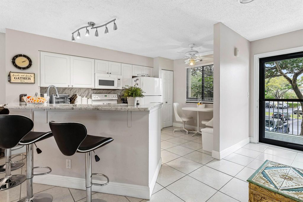 Photo of 2238 N Cypress Bend Drive #207, Pompano Beach, FL 33069 (MLS # R11065860)