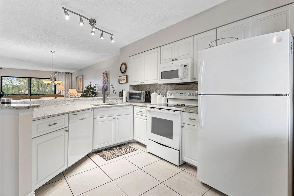Photo of 2238 N Cypress Bend Drive #207, Pompano Beach, FL 33069 (MLS # R11065860)