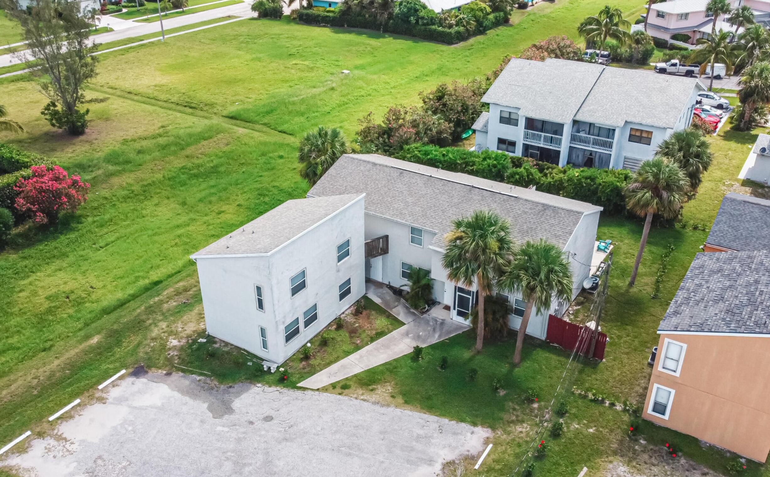 Welcome to this spacious 2-bedroom, 1.5-bathroom unfurnished apartment. This unit offers an open-concept living space, a fully equipped kitchen, and a private patio. Upstairs, you'll find two spacious bedrooms. Enjoy the convenience of being in close proximity to the beach and the vibrant nightlife and entertainment of downtown Fort Pierce.