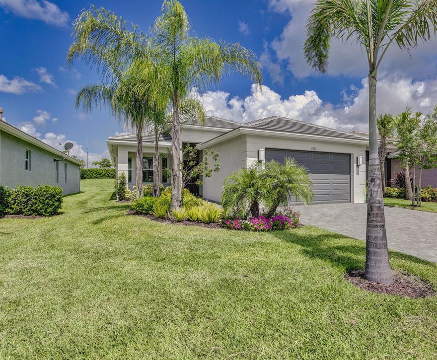 Welcome to your new home in the vibrant 55+ community  of Valencia Cay. This pristine Lucia model is 2.5 years young and features impact windows through out, plantation shutters, wood flooring, natural gas appliances, and many other upgrades. Many activities await you at your 34,000 sq. ft. clubhouse with resort style pool, cabanas, and hot tub. Meet friends at the many card rooms or eat at the VC cafe then take in a show at the 600+ seat theatre. The Riverland Sports Complex is known for its active lifestyle amenities that cater to all your interests, Dive into the 3 outdoor pools or the indoor pool, also a fantastic gym equipped for all your fitness needs. Discover tranquility in the yoga studios,play pickleball, or relax poolside and soak up the sun. The Art and Cultural Center allow you to indulge your creative side in the craft and pottery room, or cultivate your own garden in the outdoor beds provided. The demo kitchen is a hub of culinary exploration, offering many classes for both cooking or creating art. Riverland is a 4000 acre planned master community and has a commitment to outdoor living. The Paseo pathway will connect the entire community by foot, bike, or golf cart making it easily accessible for all to have fun. Plus 34 pickleball courts for all to enjoy. Don't miss out on the oppurtunity to experience this enchanting home and vibrant active lifestyle that Riverland has to offer. Your dream home and community of Riverland is calling ...Please answer the call.