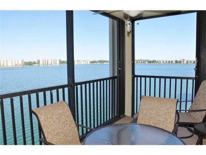 What a view!!! This waterfront 24 hr gated 2/2 condo in fabulous Lake Emerald won't last. It is a corner unit overlooking 168 acre lake just west of 195 on Oakland Park Blvd. Update kitchen with Corian countertops, W/D in the unit, newer appliances, unit in excellent condition. Premium cable included and 3 heated pools & tennis. No Pets.