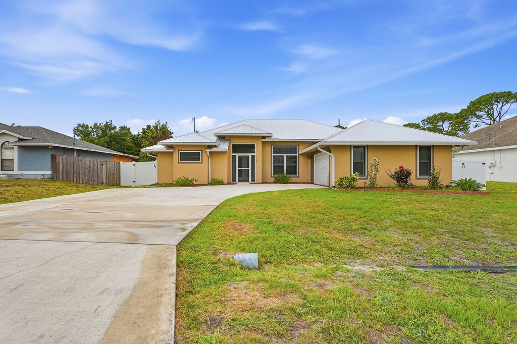 Photo of 1280 SW Kalevala Drive, Port Saint Lucie, FL 34953 (MLS # B26036976)