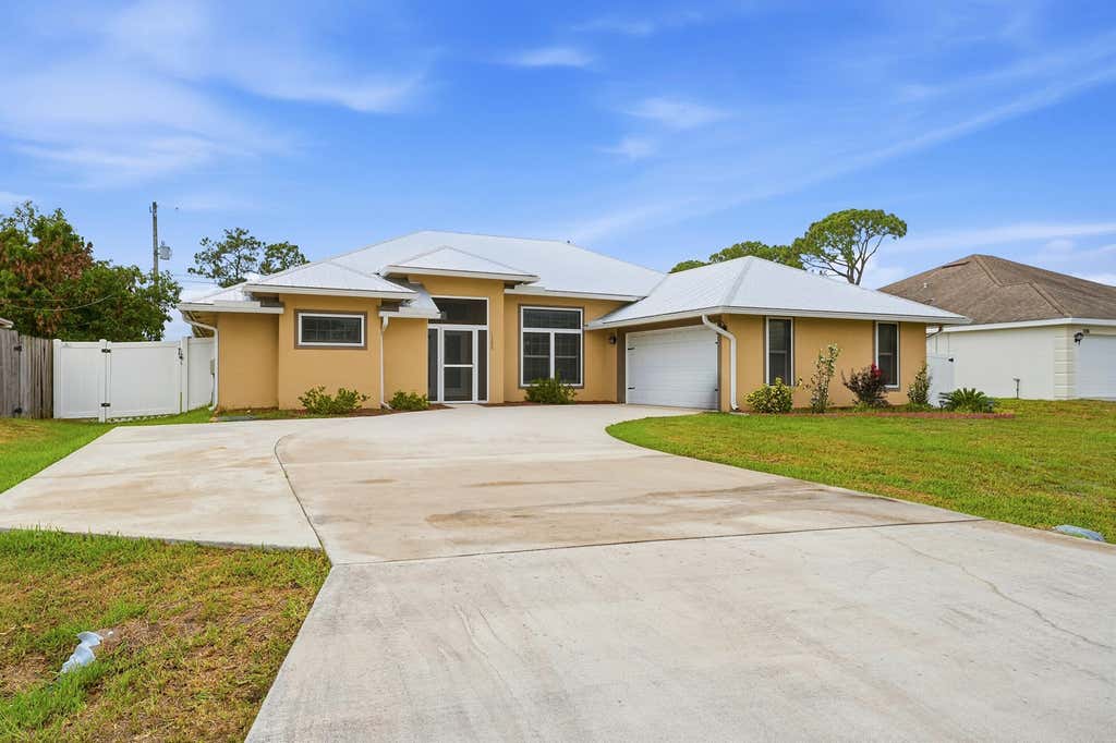 Photo of 1280 SW Kalevala Drive, Port Saint Lucie, FL 34953 (MLS # B26036976)