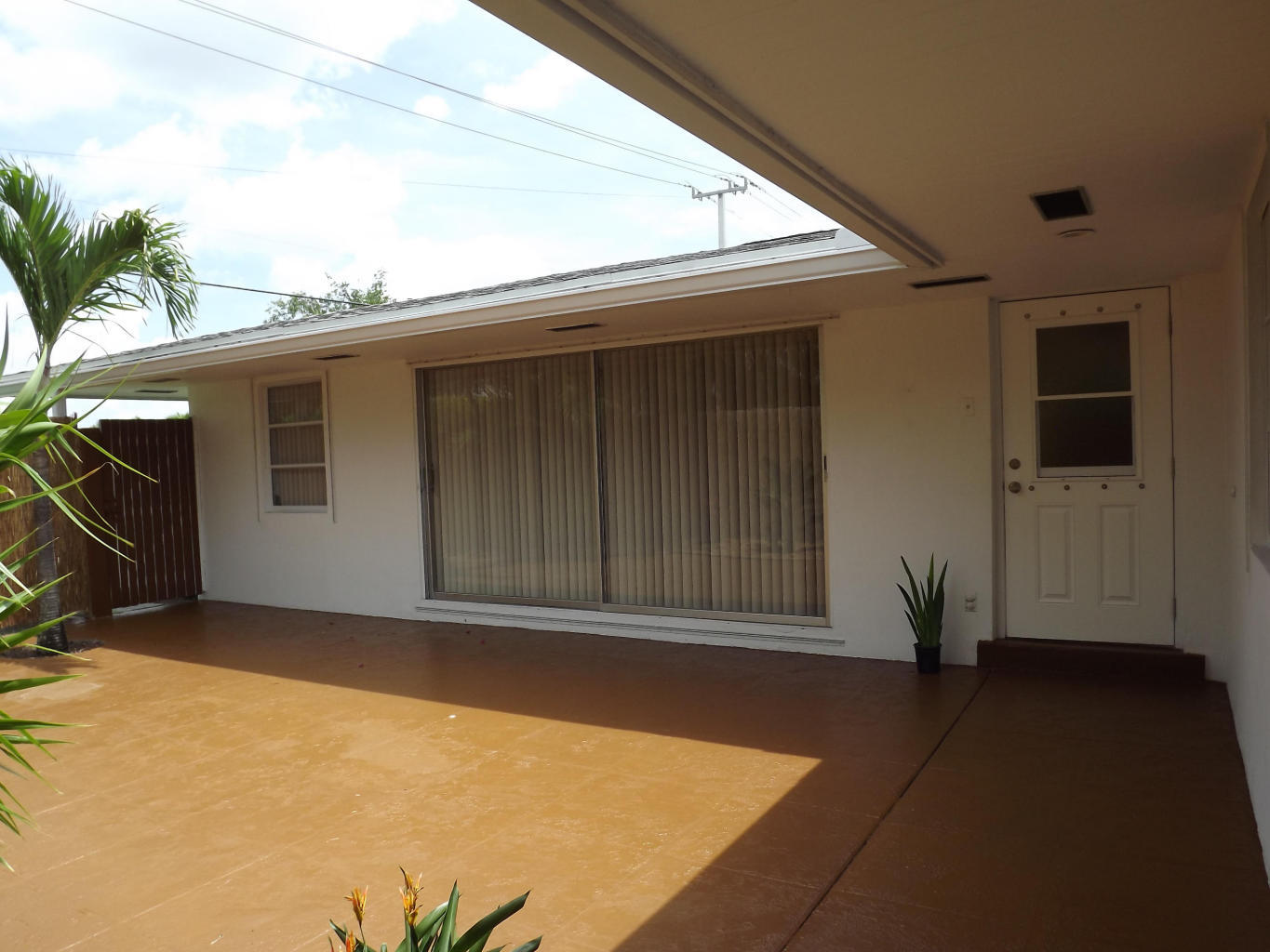 Immaculate well maintain Condo villa, private patio, master bedroom has modest California closets and flat screen mount ready for use. Custom Hurricane shutters. Bathrooms have custom cabinets and pottery barn fixtures. The walk-in closet has plenty of space including bicycle rack. New park across the street, bicycle lanes, and community pool nearby.Close to PBI airport, mall, movie theater, publix, DMV, Post Office, Police, Fire.
