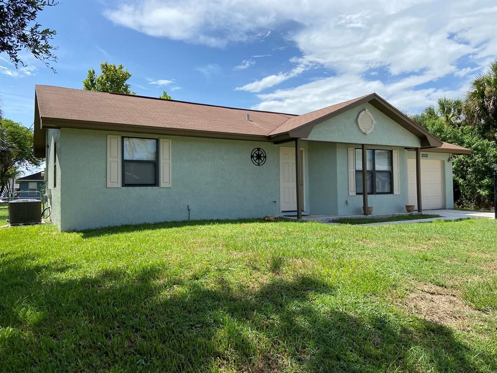 Photo of 2532 SW Calender Street, Port Saint Lucie, FL 34953 (MLS # R10735775)