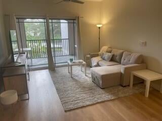 Photo of 3021 Alcazar Place #202, Palm Beach Gardens, FL 33410 (MLS # B26077422)