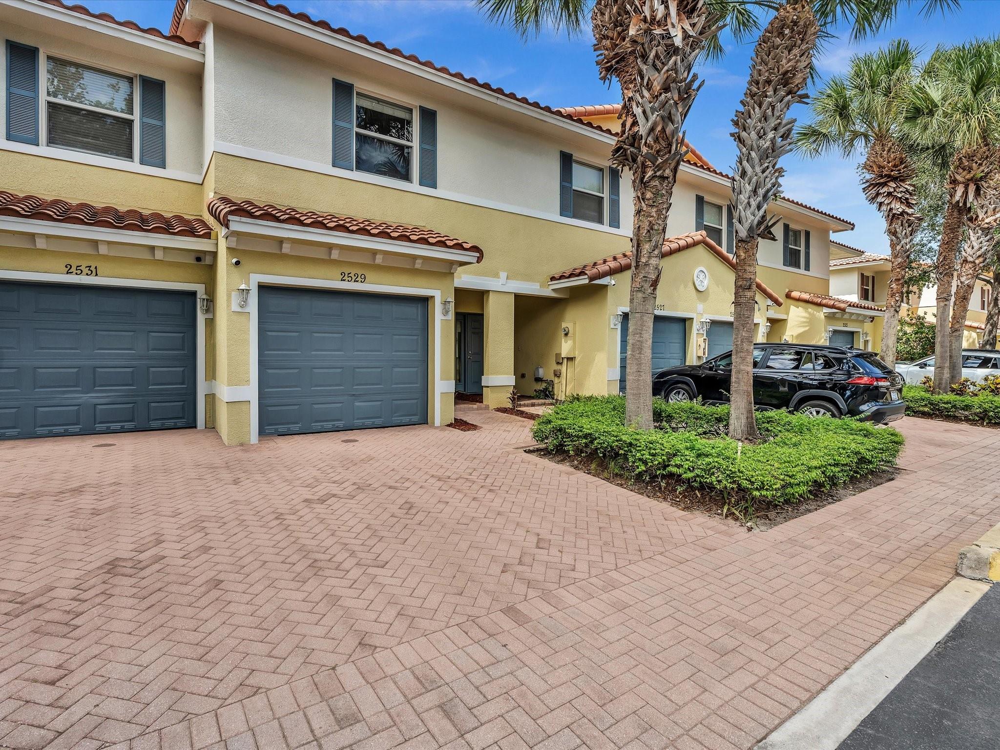 ubstantially updated with style and quality, this town home is move in ready! Enjoy the serene back patio with just green and flowers to see. With its open concept, this home feels open and airy. Almost all appliances, flooring, and the kitchen is updated and newer. Ample parking is featured with both a garage, driveway, and guest parking. Full size washer and dryer is located upstairs for ease of doing laundry. The upstairs features the bedrooms split at opposite ends of the hall so everyone gets quiet and privacy. Plenty of closet space and abundant storage here! Great location with easy access to major roads, grocery stores, shops, restaurants, Wilton Manors, and the beaches just off Oakland Park Blvd. The gated complex offers security, a heated pool, and a quiet well kept community.