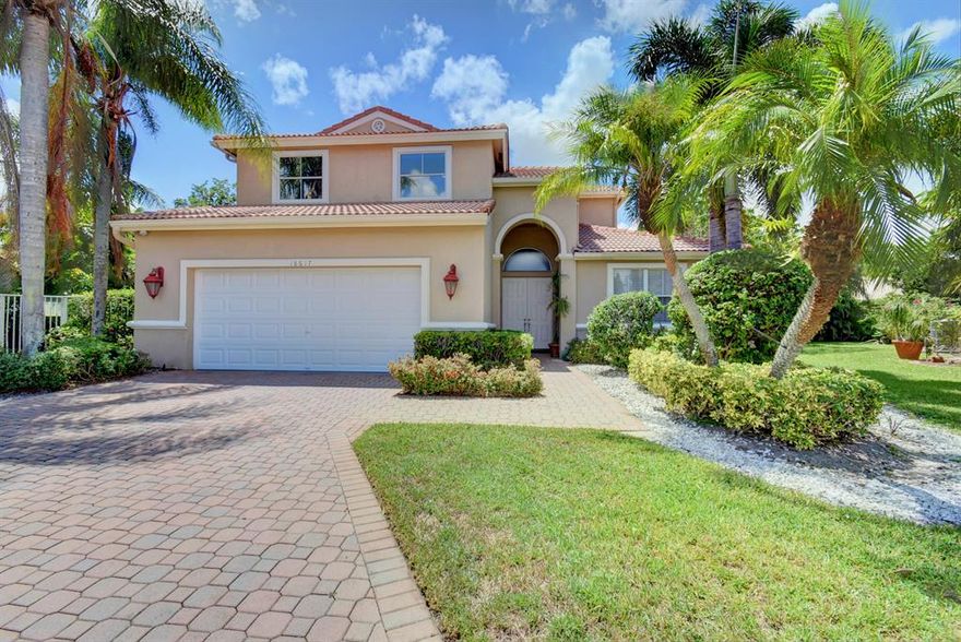 THIS CHARMING 2 STORY POOL HOME IS LOCATED ON A SUPER LARGE CUL-DE-SAC LOT IN A GUARD GATED COMMUNITY OF WEST BOCA RATON. FABULOUS FLOOR PLAN INCLUDES 4 SPACIOUS BEDROOMS & 3 FULL BATHROOMS, ONE OF THE BEDROOMS & FULL BATHROOM ARE ON THE MAIN FLOOR. A FEW FEATURES OF THIS BEAUTIFUL HOME INCLUDE GRANITE COUNTERTOPS & BACKSPLASH, STAINLESS STEEL APPLIANCES, 42'' CABINETS, 18'' CERAMIC TILES, 8 FOOT DOORS, CROWN MOLDING, VAULT CEILINGS AND JUST SO MUCH MORE.  THE EXTRA LARGE FENCED-IN BACKYARD FEATURES A LARGE COVERED PATIO AS WELL AS A HUGE OPEN POOL AREA.
THE SHORES, A 24 HRS GATED COMMUNITY OFFERS 3 TENNIS COURTS, BASKETBALL COURT, POOL, PLAYGROUND, AND CLUBHOUSE. SOUTH COUNTY REGIONAL PARK IS LOCATED RIGHT ACROSS THE ENTRANCE OF THE COMMUNITY. MUST SEE THE PRIDE OF OWNERSHIP IN THIS HOME