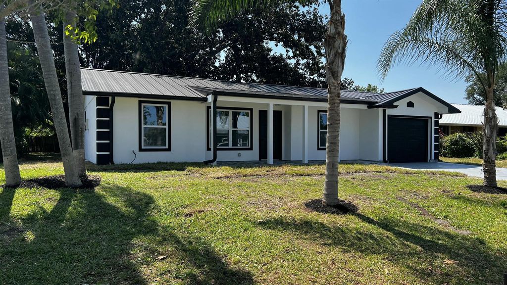 Photo of 1834 SE Bowie Street, Port Saint Lucie, FL 34952 (MLS # R11082198)