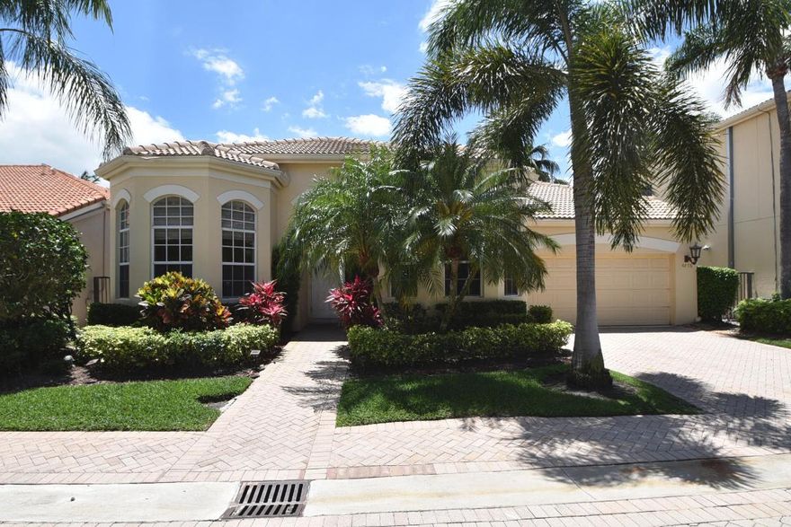 SELLER TO PAY $30,000 INITIATION FOR CLOSING PRIOR TO DEC 31, 2017!  Nestled on a private interior lot, this charming one-story home of 3 bedrooms & 3 baths is light and open with plenty of sunlight featuring volume ceilings with extra high-hat lighting; neutral beige tile flooring; white kitchen cabinetry & countertops; built-in Family Room entertainment center; built-in furnishings in the Master & secondary bedrooms; built-in credenzas in the foyer & Dining Room; marble Master bathroom; custom closet design; custom framed mirror in the Living Room; central vacuum system; newer washer & dryer; A/Cs replaced in 2011 & 2012 and a lovely private south-facing open patio with a heated pool & spa. Great space & value!