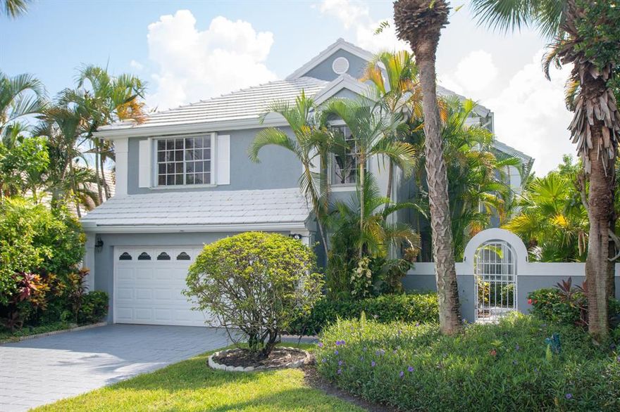 Stunning LAKEFRONT home on private cul-de-sac street in The Colony neighborhood in popular BREAKERS WEST.   Lg screened patio with salt chlorinated pool and spa with long lake views!  NEW ROOF 2017.  Dramatic, airy living room w/fireplace opens to covered patio & pool.  Updated kitchen w/center island opens to Family Room with wood ceiling.  Granite counters, stainless steel appliances & custom cabinetry with pull-outs. Upstairs bedrooms provide a quiet retreat with very spacious Master Suite featuring vaulted ceiling, crown molding and 2 generous closets.  Master Bath has updated shower with frameless glass enclosure.  Guest bedrooms also have good closet space and a Jack and Jill bath between them.  Additional storage under staircase too. Accordion shutters for hurricane protection. Bonus workshop area with sink in garage.  Centrally located to downtown West Palm Beach, PBI, beaches and Wellington equestrian amenities.  Breakers West offers all the advantages of a country club community but the club membership is NOT mandatory.  But there are Golf, tennis/social memberships available at either Breakers West or Mayacoo Lakes CC.