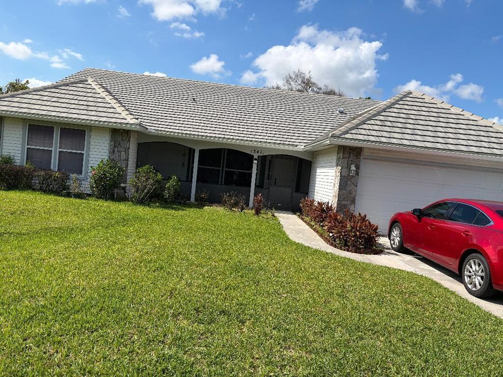 Photo of 1341 SW Maplewood Drive, Port Saint Lucie, FL 34986 (MLS # B26029238)