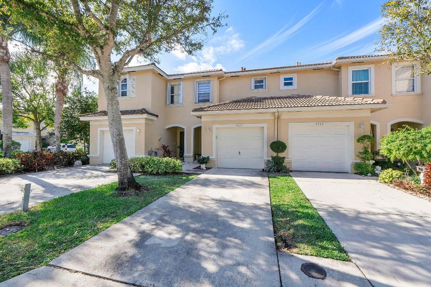 Welcome to your new happy place in the charming Towne Place. All hurricane protection. This spacious townhome features an updated open concept tiled first floor including a newer remodeled kitchen with SS appliances. Large countertop for easy entertaining. Pantry too! Half bath for guests as well. Enjoy screened patio (with storage) off the large open living room, for morning coffee or evening refreshments. Newer luxury window treatments. Upstairs boasts 2 large bedrooms with private bathrooms. Ample sized loft/flex room for office, BR or workout area. Primary suite includes a generous walk-in closet and brand new carpeting. Home includes one car garage, steps to community pool. Minutes to shopping, entertainment and top rated schools. Enjoy everything Equestrian in the city of Wellington