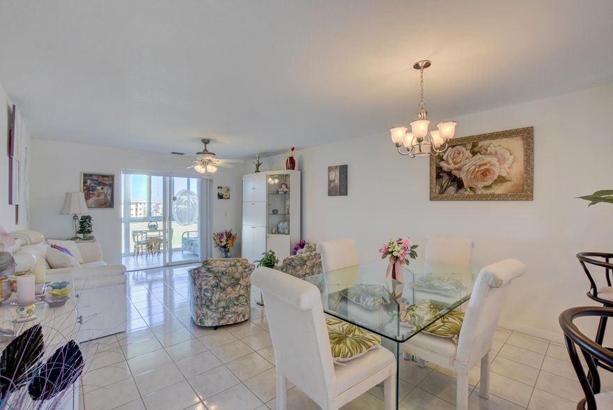 Open Concept, light, airy and sunny; TURNKEY furnished 4th floor - 2 bed, 2 bath condo with garden view in this 55+ community in Boynton Beach.This condo was completely renovated in 2007 from walls to windows!  HURRICANE IMPACT WINDOWS, floor to ceiling in the Florida room; ceramic tile throughout (carpet in master). A/C 2016! PLUS!! SECURED elevator entry and cameras. Assigned Parking in front of entry! Amenities include 2 clubhouses, two heated pools, theatre, card rooms, business center, gym, tennis, bocci plus so many activities. Close to I95, Palm Beach Airport, shopping centers, quick drive to Downtown Delray restaurants and shops; easy drive to the Beach! READY for immediate move in! A no snow zone where you will relax and enjoy all that Florida has to offer! MOTIVATED SELLERS