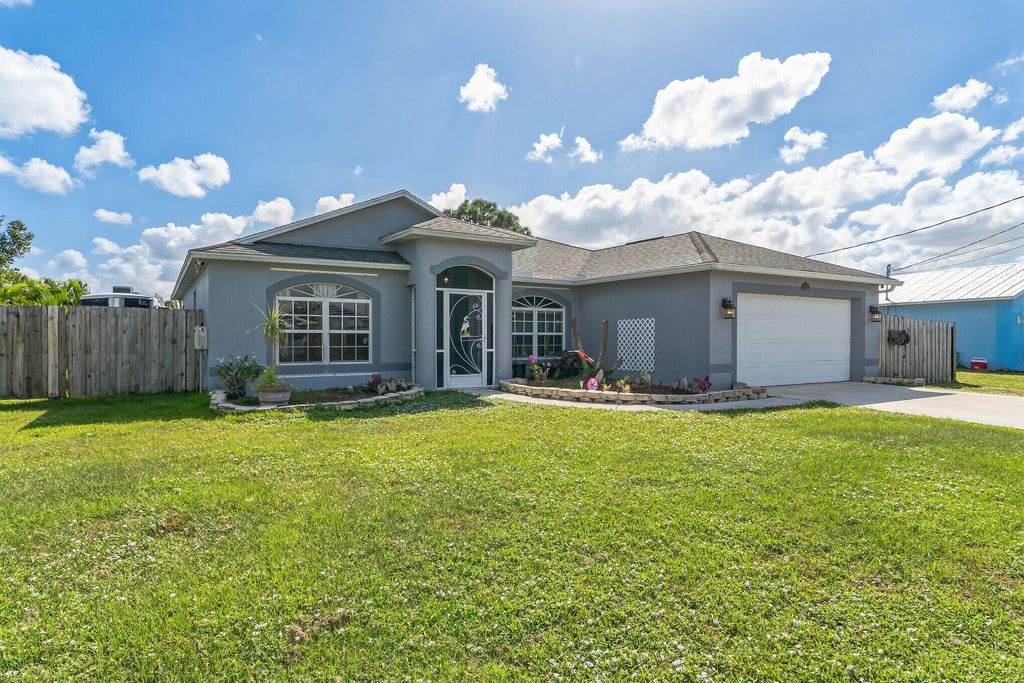 Photo of 5303 NW Almond Avenue, Port St Lucie, FL 34986 (MLS # R10931952)