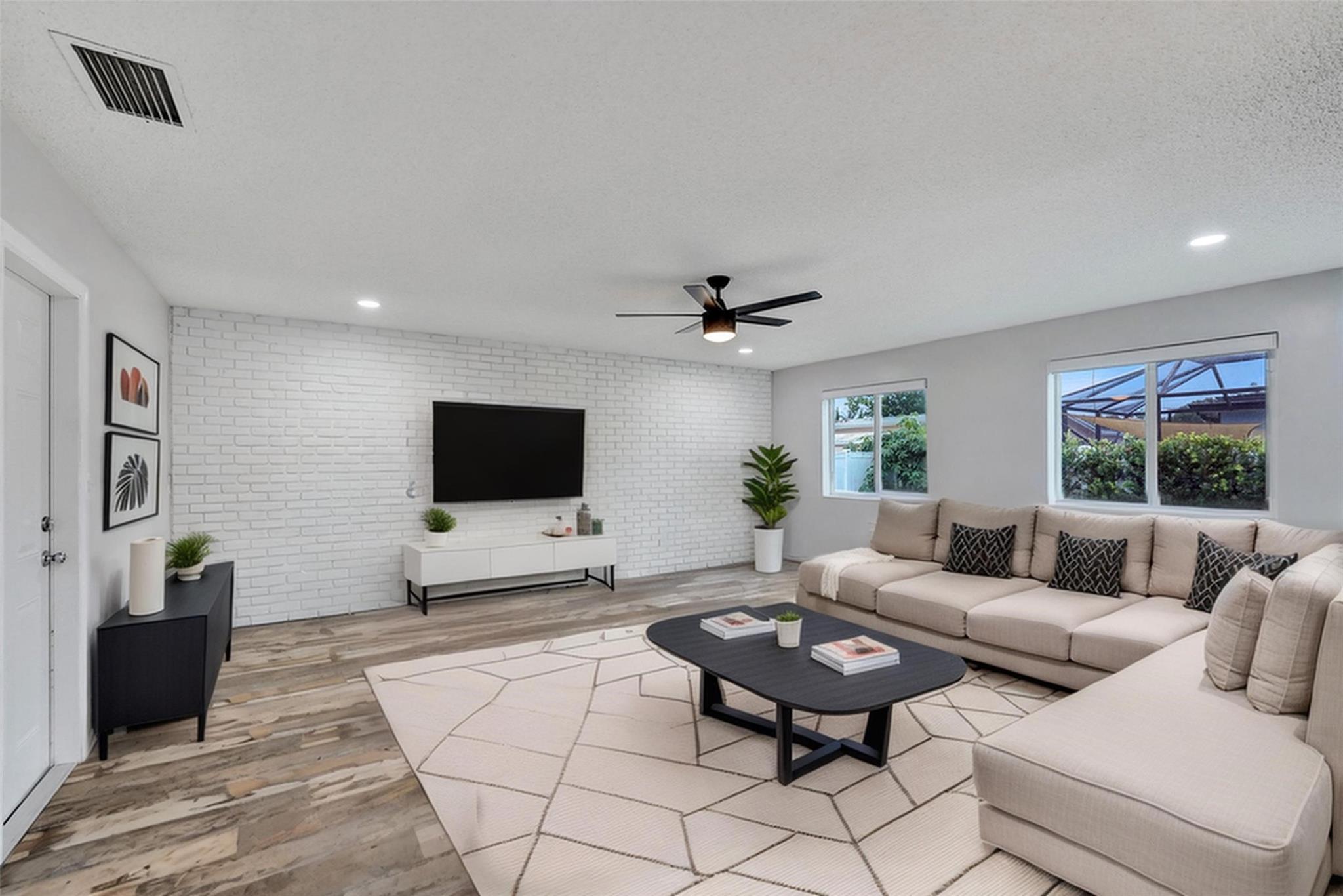 BRAND NEW LISTING "Charming in Cooper City" with over $75K in upgrades! This 3 bedroom, 2 bath home is nestled in the desirable Cooper Colony community known for it's cascading tree lined streets, walking distance to A+ schools, and NO association fees! Key features include ALL IMPACT DOORS & WINDOWS, a NEW open concept kitchen with custom cabinetry, butcher block countertops, coffee or wine bar & SS appliances. A/C-5 years old. Roof-9 yrs. Rustic luxury vinyl flooring throughout. Plenty of space for the entire family-spacious floorplan that has a separate living room & large family room with accent wall. Coverd patio is great for backyard BBQ's. 2 car garage. Fenced yard with double gates. Great location-walk to 3 "Top Rated" Cooper City Schools! Plus a $7K CREDIT FOR BATHROOM UPDATE!!