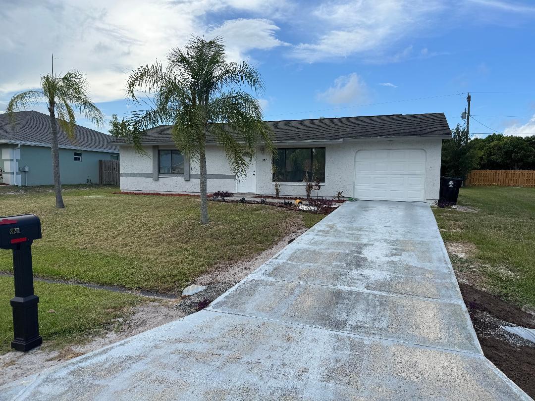 Don't miss this great opportunity to get this well-maintained, affordable home located in a great community that is nestled around the St. Lucie River. This home features well coordinated flooring and tile work, large bedrooms, a well desgined backyard scheme with pavers and a fire-pit. The lot offers plenty of room for expansion. If you are a first time buyer looking to get into home ownership, then this is a great value and a great opportunity! Schedule your private showing today!