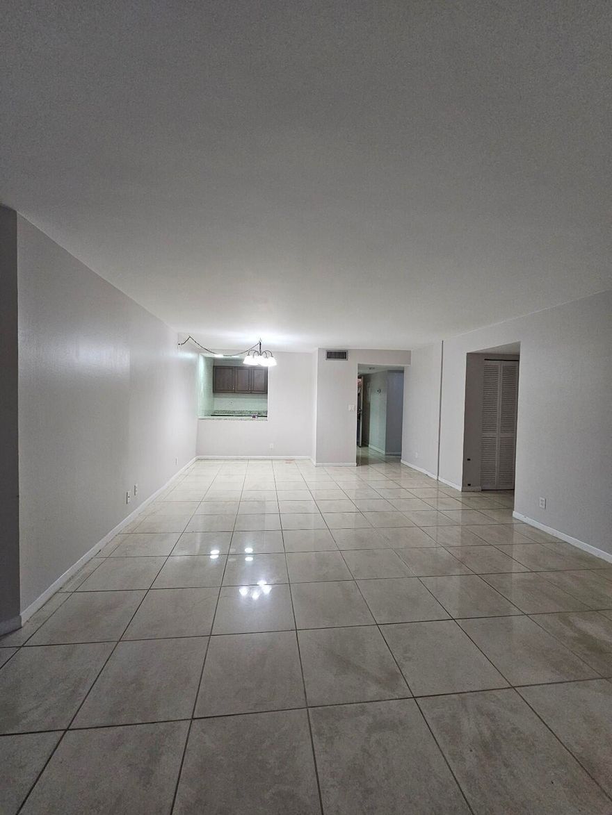 IN THE WALKING DISTANCE OF PALM BEACH OUTLET ,  CORNER  REMODELED 2 BEDROOM WITH 2 FULL BATHS APARTMENT. NEWER KITCHEN CABINETS, NEWER STAILESS STEEL APPLIANCES. ELEVATOR BLDG.CLOSE TO BEACH AND SHOPPING.