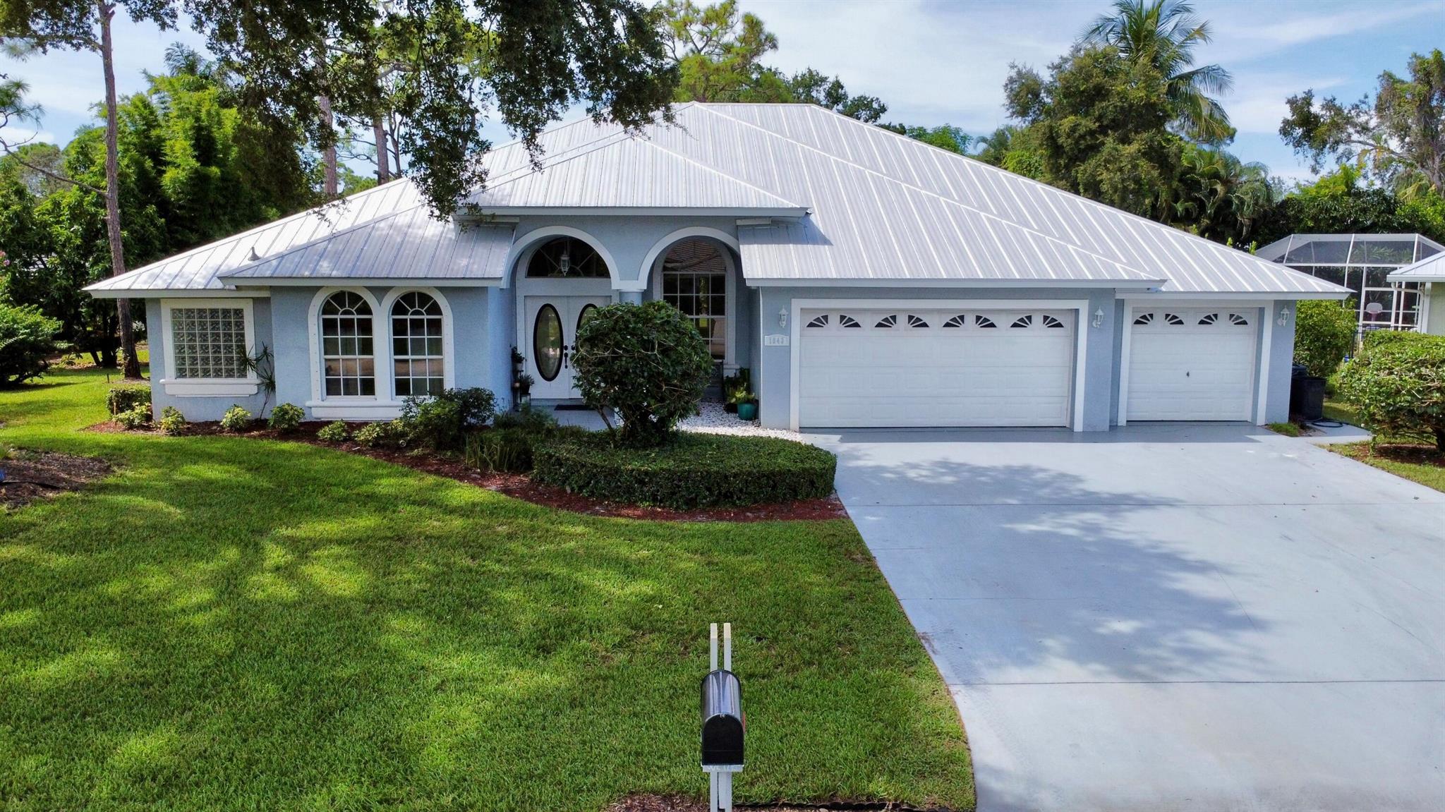 Live the ultimate Florida lifestyle in this beautifully appointed 4BR + office / 3BA waterfront pool home located in one of Palm City's most sought-after communities. Enjoy ocean access, a community boat storage lot, and a day dock with fish cleaning station -- perfect for avid boaters and anglers.Situated on a scenic lake, this home offers peaceful views and fantastic fishing right from your backyard. Inside, you'll find a spacious layout featuring an expansive owner's suite, a separate home office, and a cabana bath that opens directly to the large screened-in patio, heated pool, and hot tub.Additional features include: 3-car garage Open-concept living areas Split bedroom floor plan Access to community tennis court and playground.
