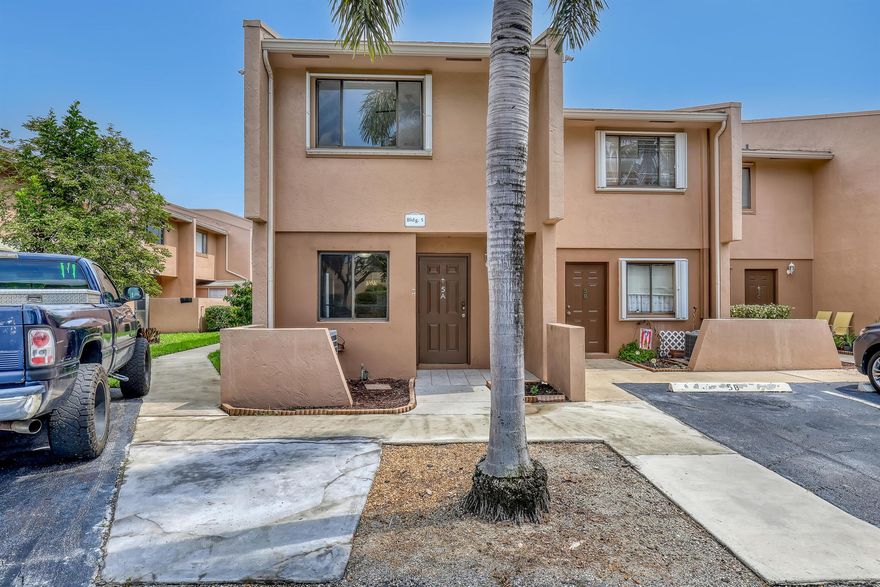 Welcome to this charming 3-bedroom, 2.5-bath corner Townhome in sought-after Royal Palm Village, located in the heart of Royal Palm Beach. This home is surrounded by parks, shopping, dining, and offers easy access to schools and highways.Inside, you'll find a spacious living room and bedrooms filled with natural light from large windows. The home features newer stainless steel kitchen appliances, granite countertops, and tile flooring. Enjoy comfort with a newer AC and water heater, along with hurricane shutters for added peace of mind. In addition, two designated parking spots right in front. The screened-in patio feels like a private yard, perfect for entertaining, with the community pool just steps away.The HOA covers roof maintenance, water, sewer, trash and