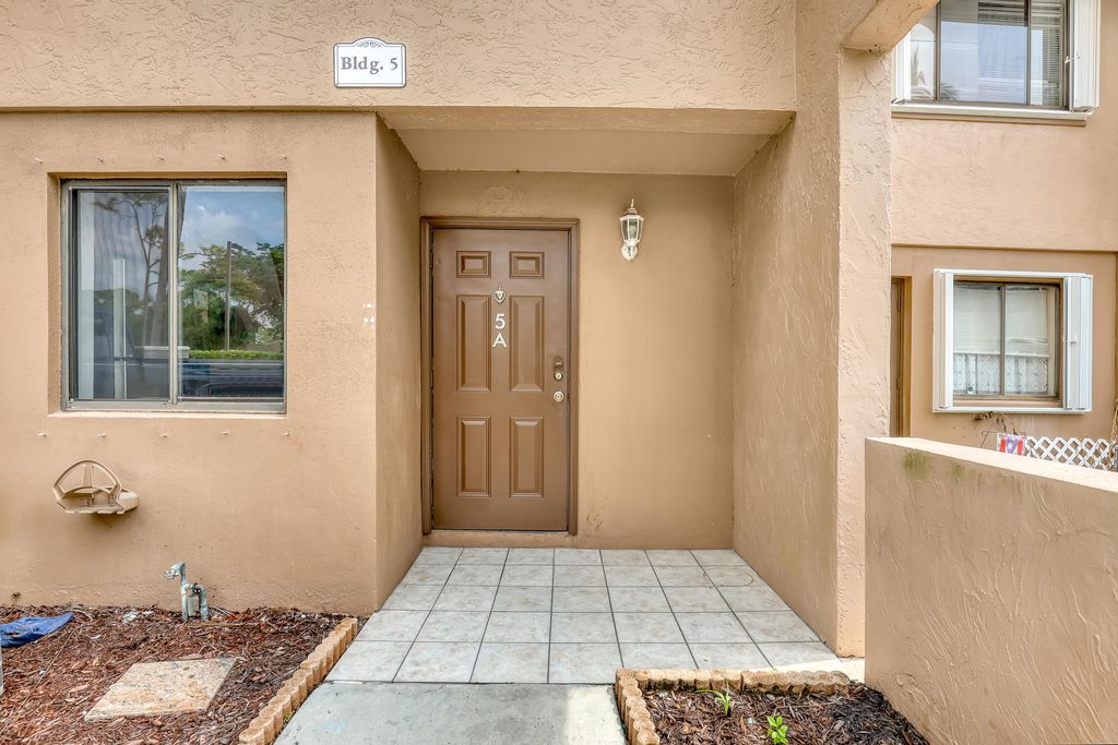 Photo of 139 Sparrow Drive #5a, Royal Palm Beach, FL 33411 (MLS # R11122562)