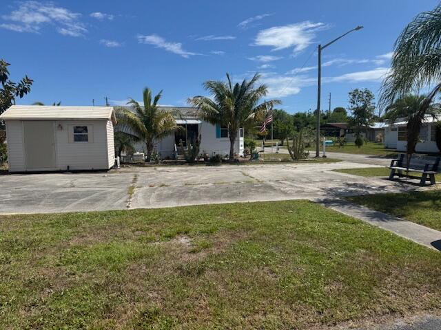 55 + CO-OP Community, Whispering Creek. Vacant Lot...Ready for Your Mobile Home or Tiny Home! That's right...TINY HOME APPROVED! This cleared and ready-to-go lot is nestled in a welcoming CO-OP community where you OWN the land and a share of the park, not a land lease! Unbelievably low HOA...just $250 a month! Beautiful corner lot with storage shed included, bring your vision and settle into affordable Florida living with ease. Whether you're dreaming of a cozy mobile home or a trendy tiny home escape, this is your blank canvas in a peaceful, community-oriented setting.
