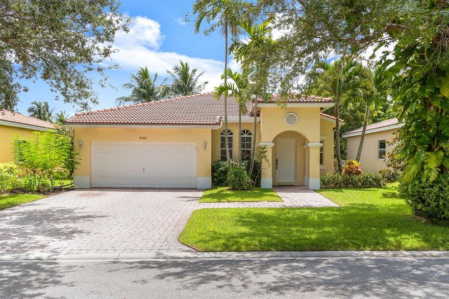 Fantastic 3 bed/ 2 bath home featuring long lake views located within the highly sought after private gated community of Coquina in Coconut Creek. This one-story model boasts an open floor plan with ceramic tile and laminate flooring, volume ceilings, recessed lighting, an open kitchen with eat-in bar, shaker style cabinetry and breakfast nook. Other notable features buyers will love include: freshly painted interior (all rooms) as well as back patio, large master suite with walk-in closet, screened in patio, hurricane shutters, fruit trees in the backyard (including mango tree) and a short walk to community pool. SEE SUPPLEMENT. This community is nestled in the thriving city of Coconut Creek, bordering Parkland and Coral Springs. Ideal location in close proximity to the Promenade at Coconut Creek, which is an epicenter for shopping, fine dining, and entertainment. Tradewinds Park, Butterfly World, an Equestrian Park, excellent schools, and major highways are only a short drive away. No wonder Coconut Creek was Spotlighted as one of the "Best Cities to Live in America" by Money Magazine, and "Top Ten Place to Live in Florida" by Movoto and NerdWallet! Don't miss out on this one. Schedule a showing today!