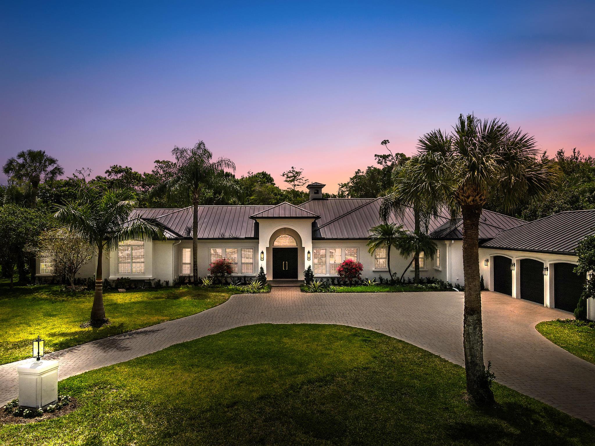 Experience elevated living in this completely renovated luxury estate on a private cul-de-sac in the heart of Wellington--with no HOA. This 4-bedroom, 5.5-bath masterpiece features private en-suites, a dedicated office, and a sound proof 730 sqft hobby room that can be used as a movie theatre or another bedroom. Enjoy peace of mind with a brand-new standing seam metal roof, full house generator, impact windows, and a reverse osmosis water system. The gourmet gas kitchen with custom cabinetry and designer finishes opens to bright, airy living spaces. Step outside to your own resort-style retreat with a saltwater pool and spa, fully equipped outdoor kitchen, and a rare half-court basketball/pickleball court. Every detail of this home exudes comfort, quality, and timeless style--